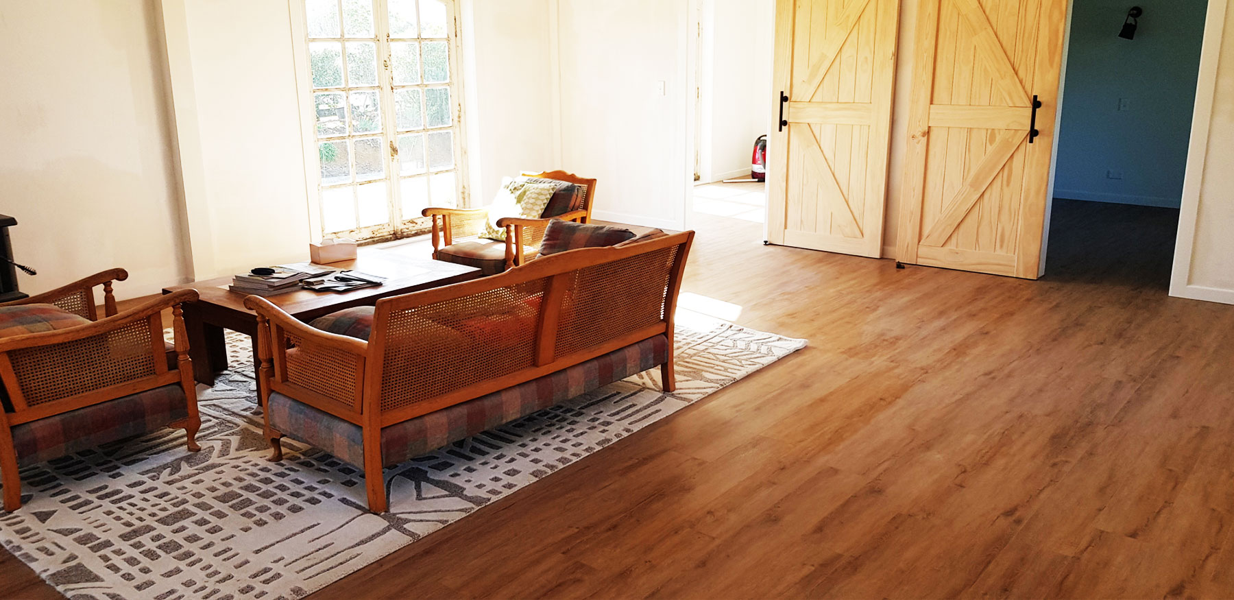 DualCore SPC Light Oak flooring detail showing realistic wood-grain texture
