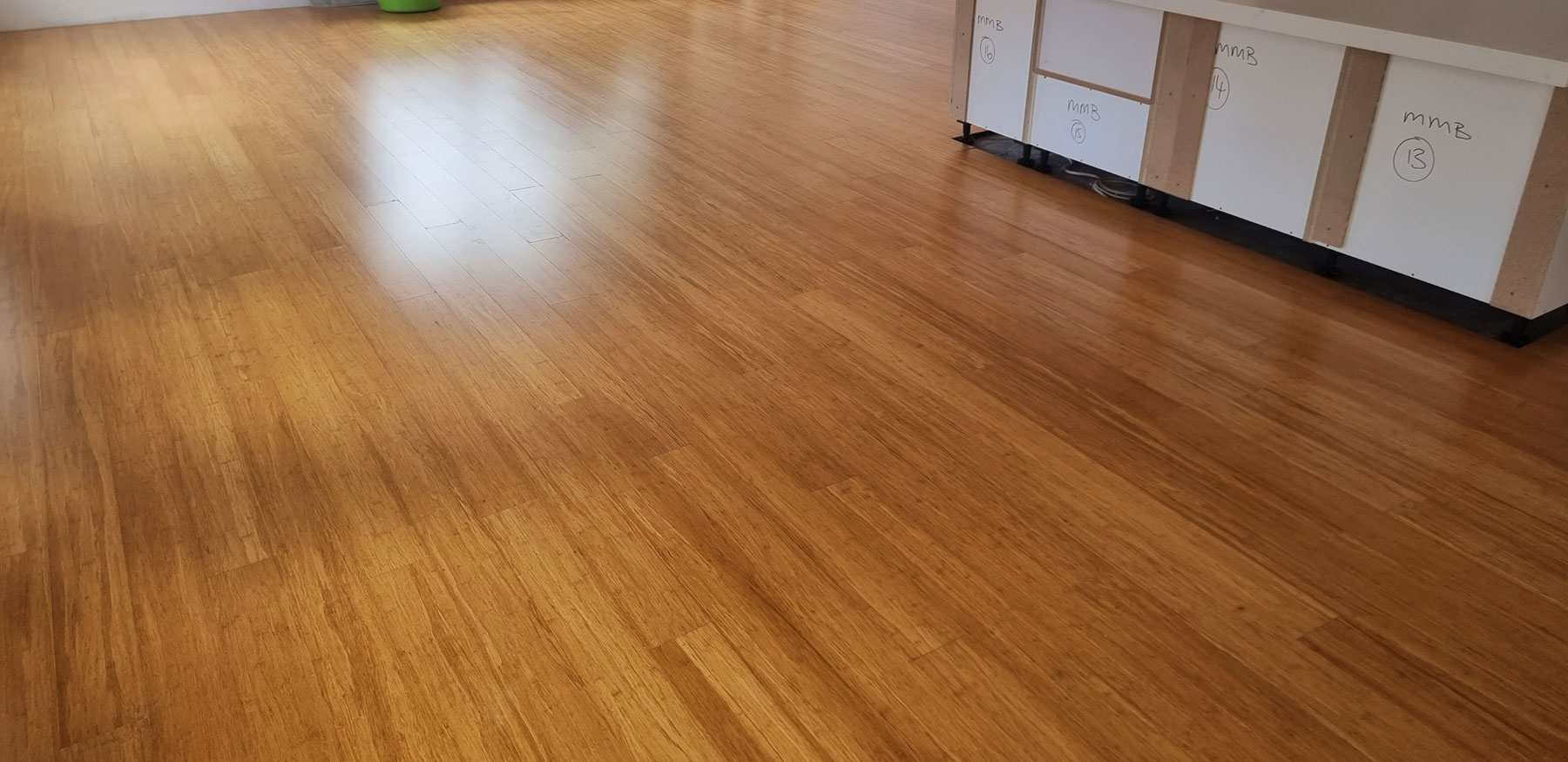 Champagne bamboo flooring installed alongside modern home furnishings
