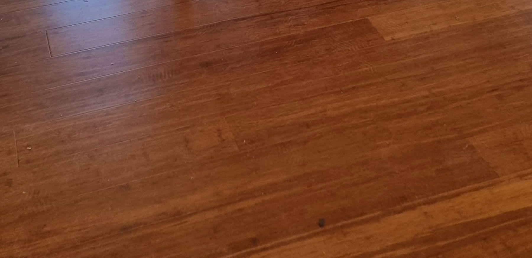 Light Coffee bamboo flooring transition detail showing professional finishing